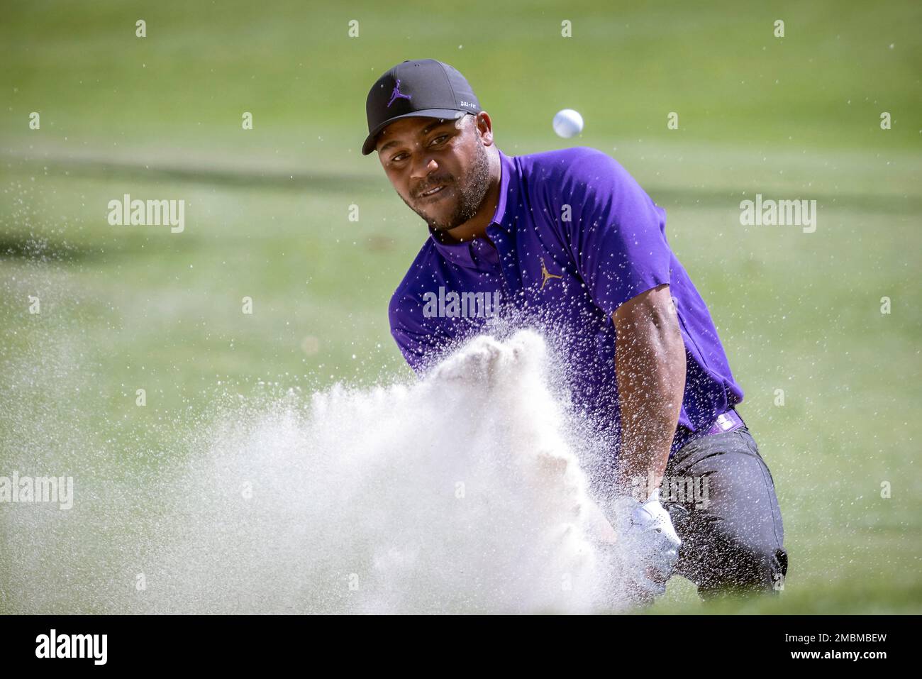 Harold Varner III hits out of a bunker on the ninth hole during the final round of the RBC Heritage golf tournament, Sunday, April 17, 2022, in Hilton Head Island, S.C