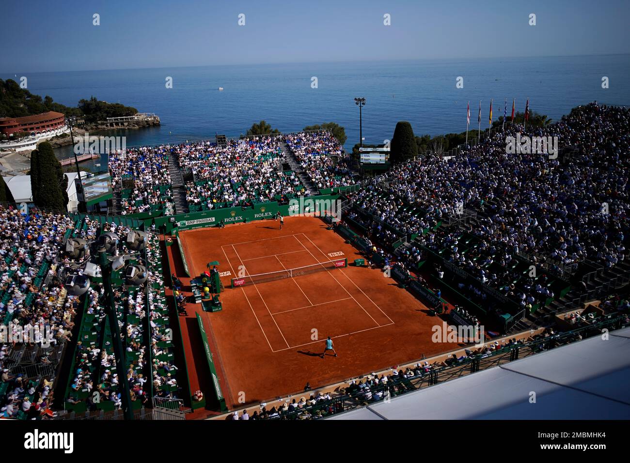 The crow watch Stefanos Tsitsipas of Greece, playing Alexander Zverev, of Germany, during their semifinal match of the Monte-Carlo Masters tennis tournament, Saturday, April 16, 2022 in Monaco
