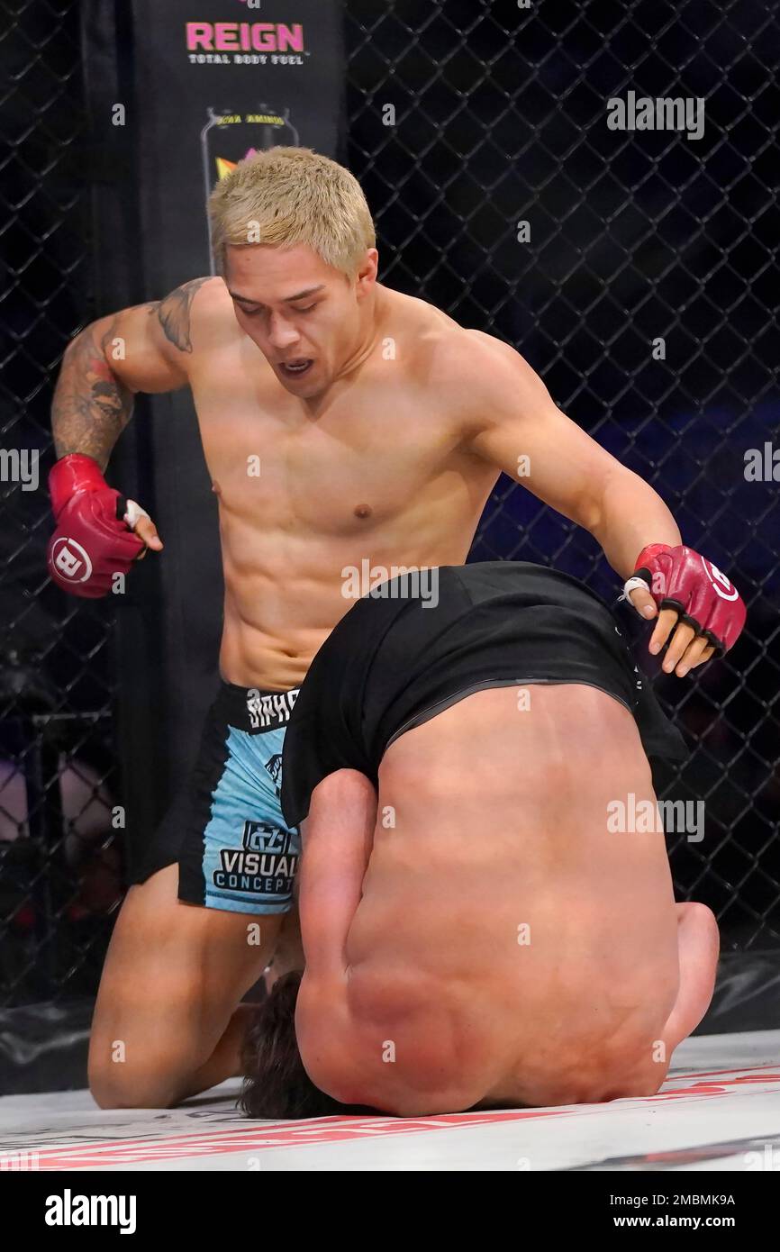 Tyson Siphavong-Miller, top, punches Rhalan Gracie during a welterweight fight at the Bellator 277 mixed martial arts event in San Jose, Calif., Friday, April 15, 2022