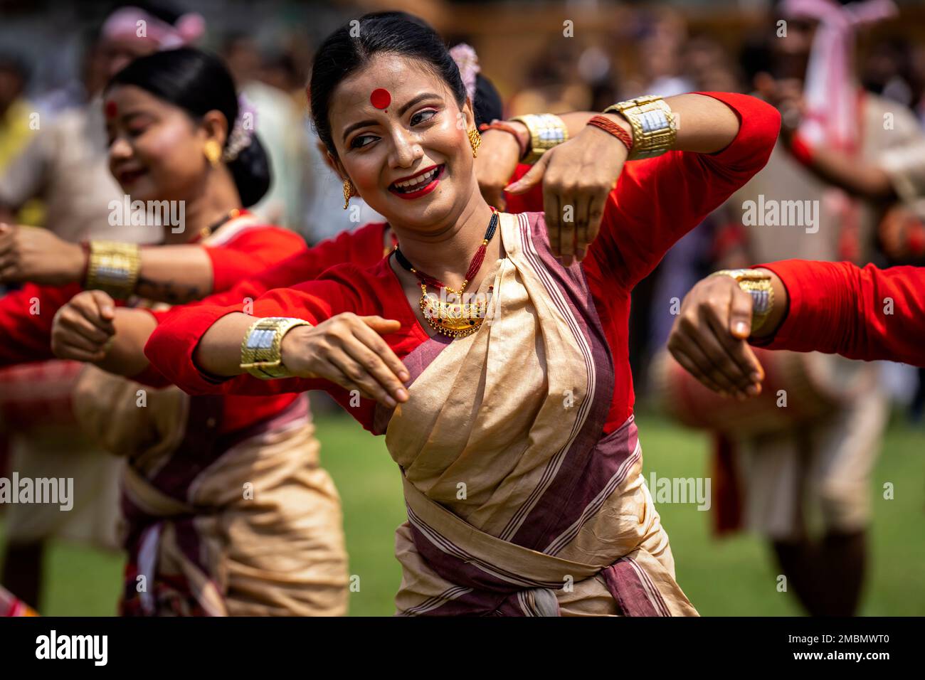 Assamese Girls In Traditional Mekhela Chadar Perform Bihu A Folk Dance During Celebrations To