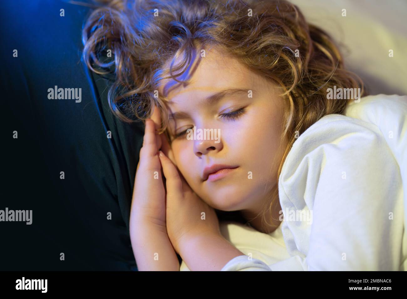 Little kid sleeps. Child sleeping on bed at home. Bedtime, kid sleeps