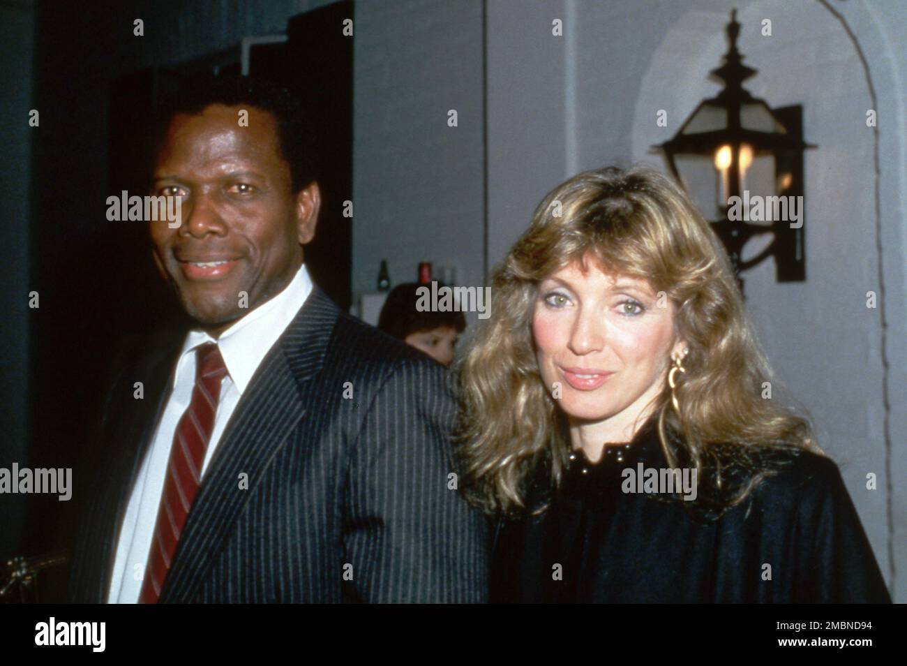 Sidney Poitier and Joanna Shimkus  Circa 1980's Credit: Ralph Dominguez/MediaPunch Stock Photo
