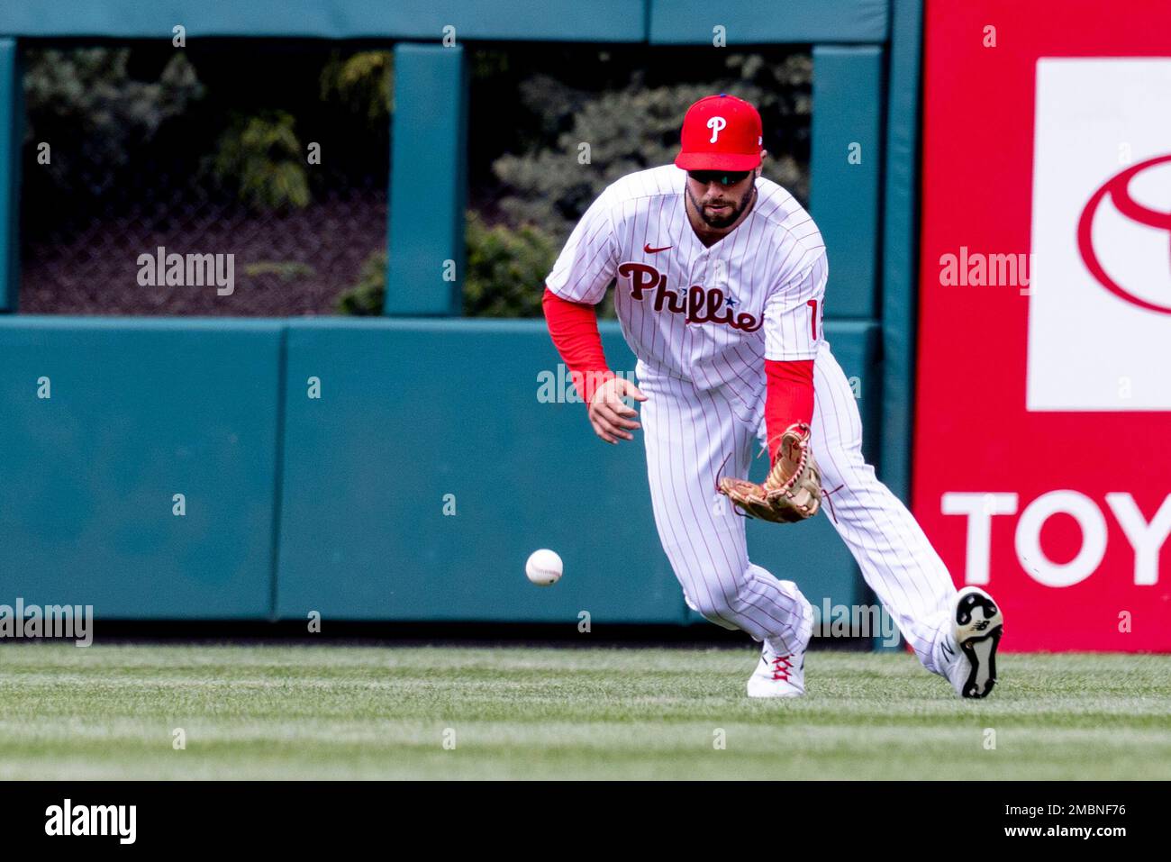 Philadelphia Phillies center fielder Matt Vierling (19) fields a single ...