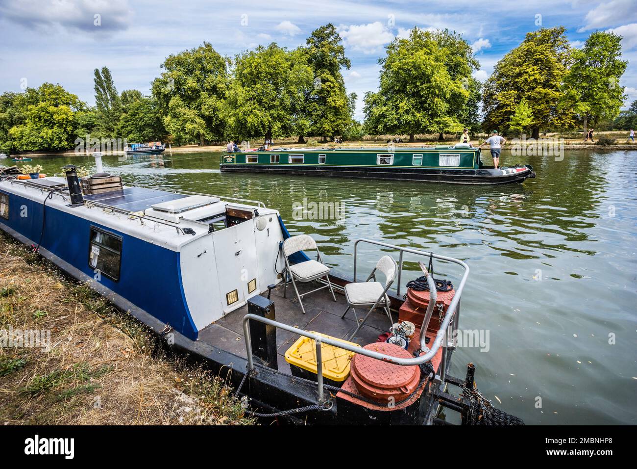 narrowboats on the river Thames at the Christ Church Meadow walk, Oxford, Oxfordshire, South East England Stock Photo