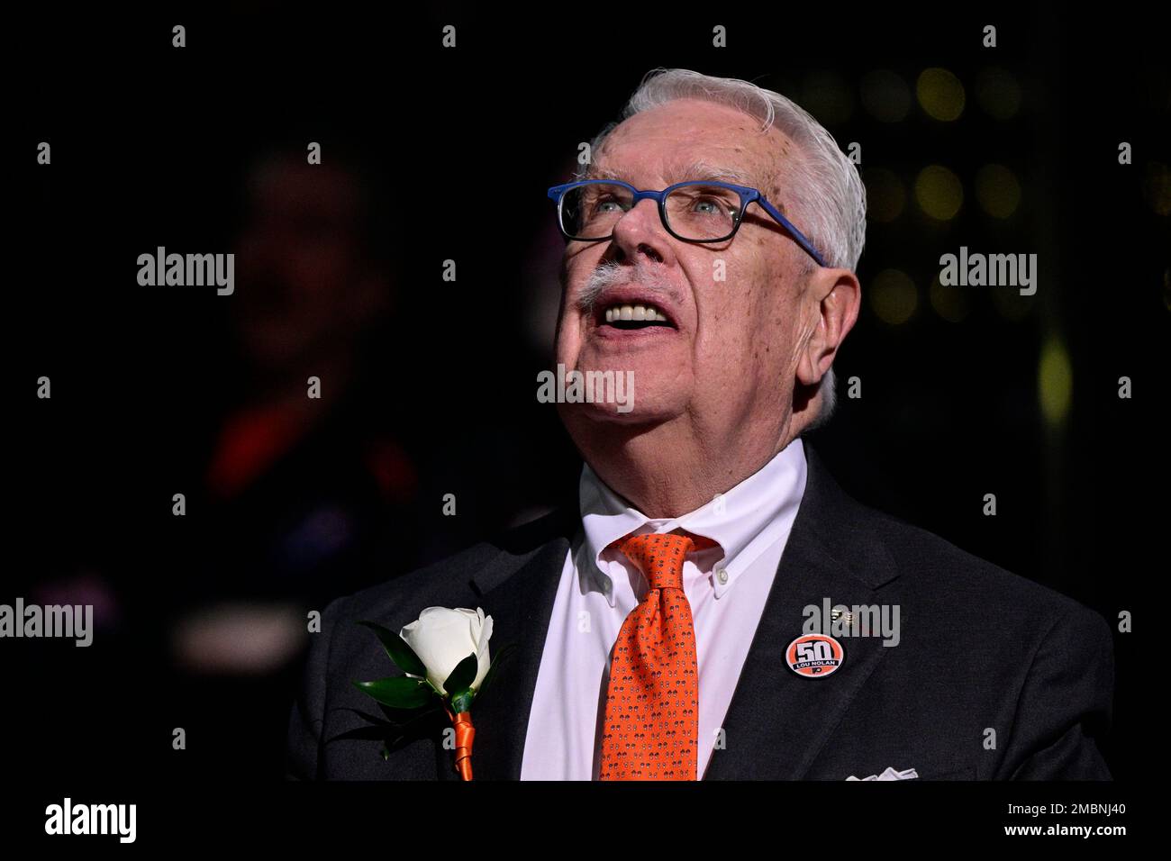 Philadelphia Flyers public address announcer Lou Nolan is honored prior