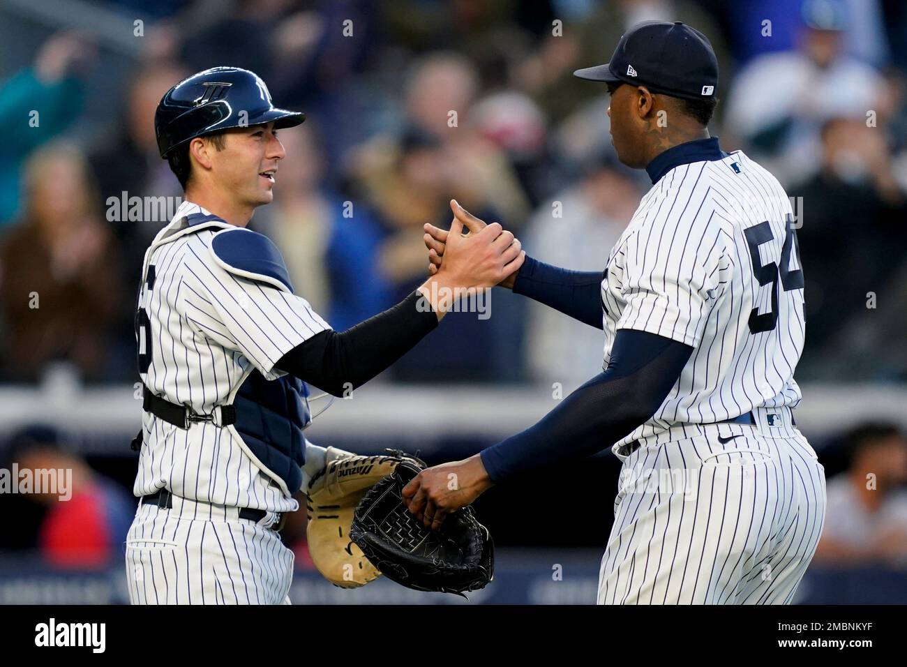 New York Yankees relief pitcher Aroldis Chapman (54) and catcher Kyle