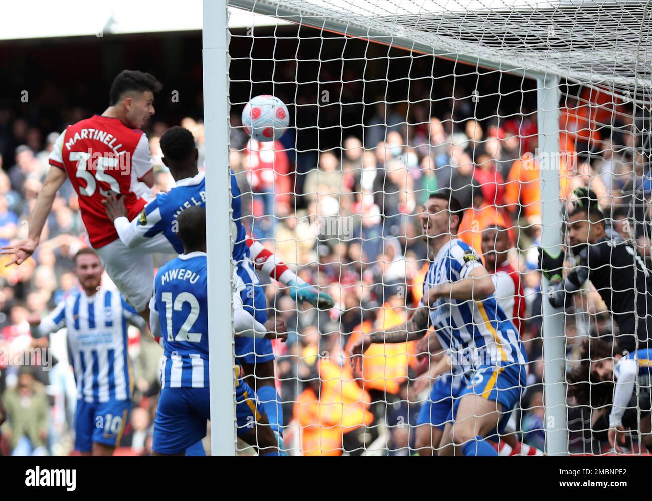 Arsenal's Gabriel Martinelli, left, scores a disallowed goal during the