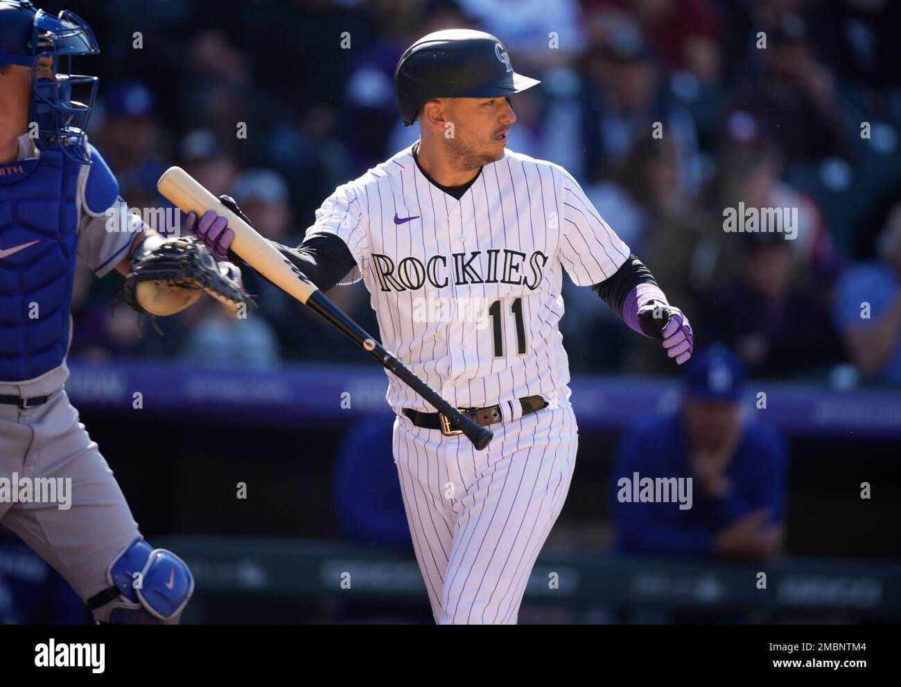 Colorado Rockies' Jose Iglesias reacts after striking out against Los ...