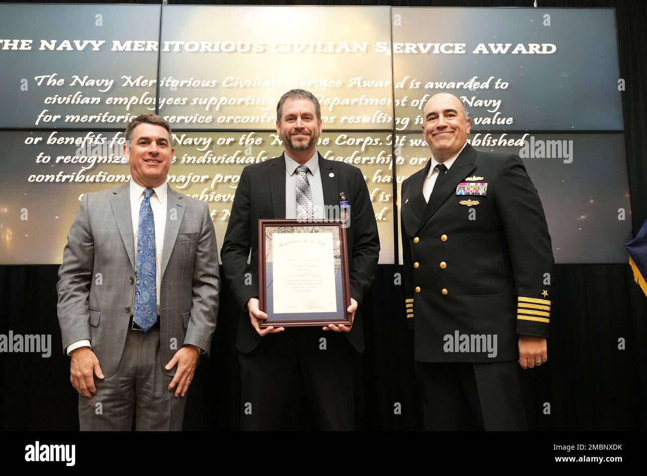 Dr. Christopher Lloyd receives the Navy Meritorious Civilian Service