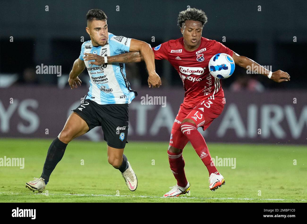 Aquilino Gimenez of Paraguay's Guairena FC, left, and Luciano Pons