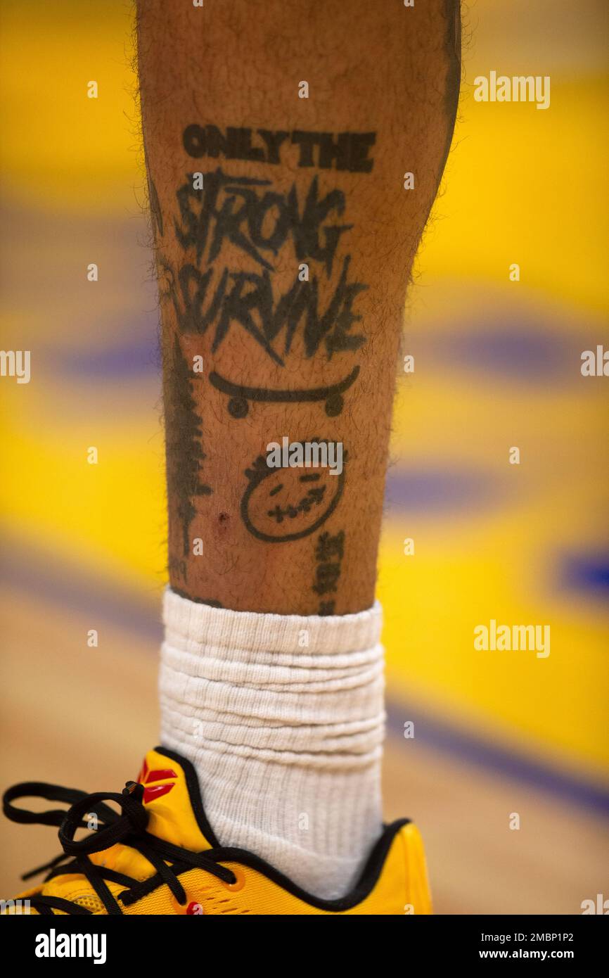 A tattoo on the leg of Golden State Warriors guard Jordan Poole