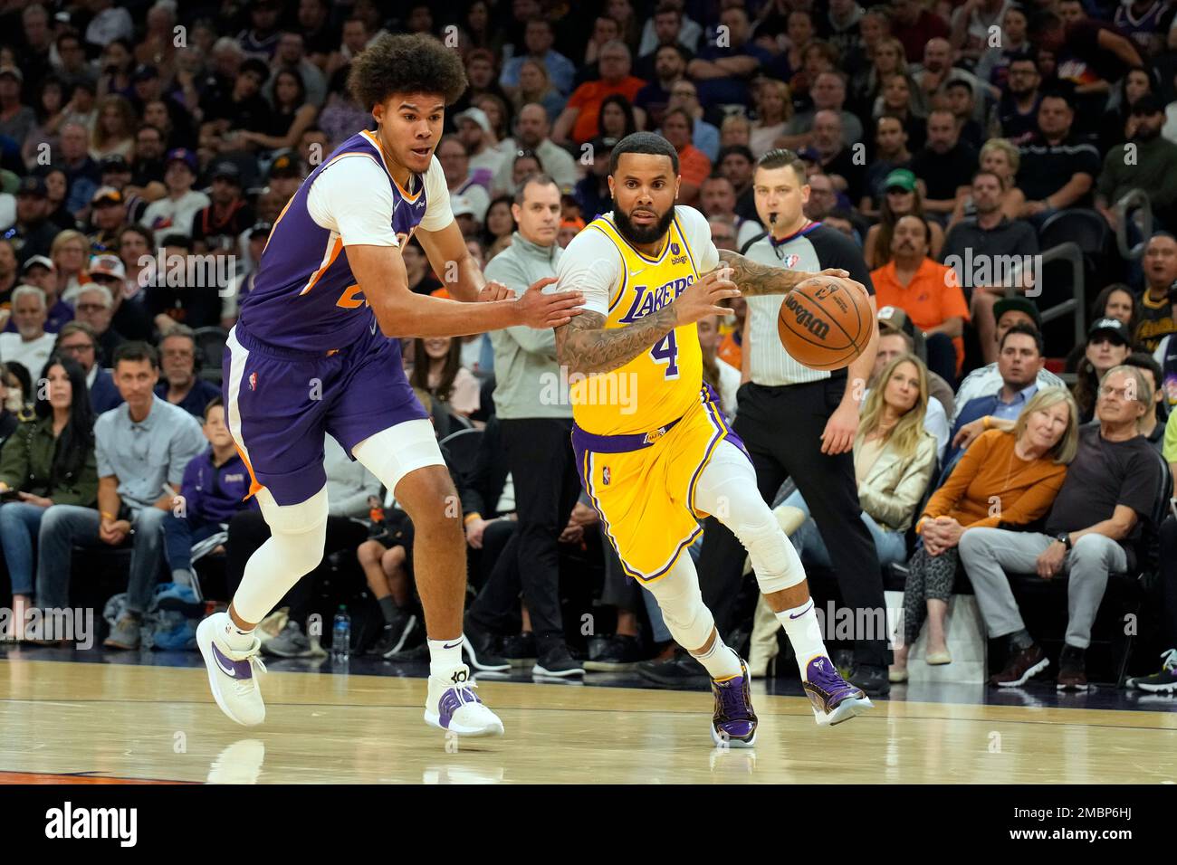Los Angeles Lakers center D.J. Mbenga, left, takes the ball from Phoenix  Suns guard Steve Nash, right, during the first half of Game 1 of their  Western Conference Finals series at Staples