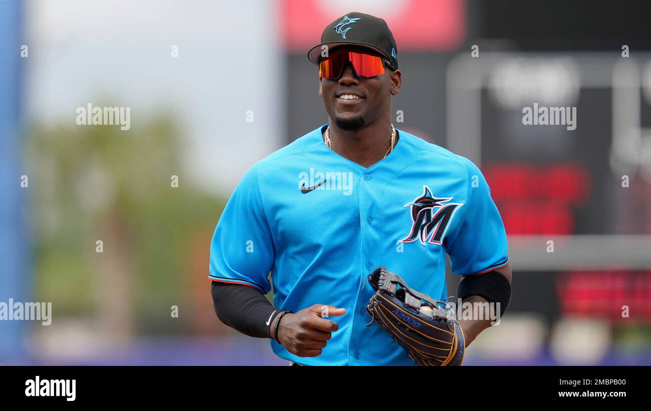 Miami Marlins' Jorge Soler runs in from the outfield during a spring  training baseball game against the New York Mets, Sunday, April 3, 2022, in  Port St. Lucie, Fla. (AP Photo/Sue Ogrocki