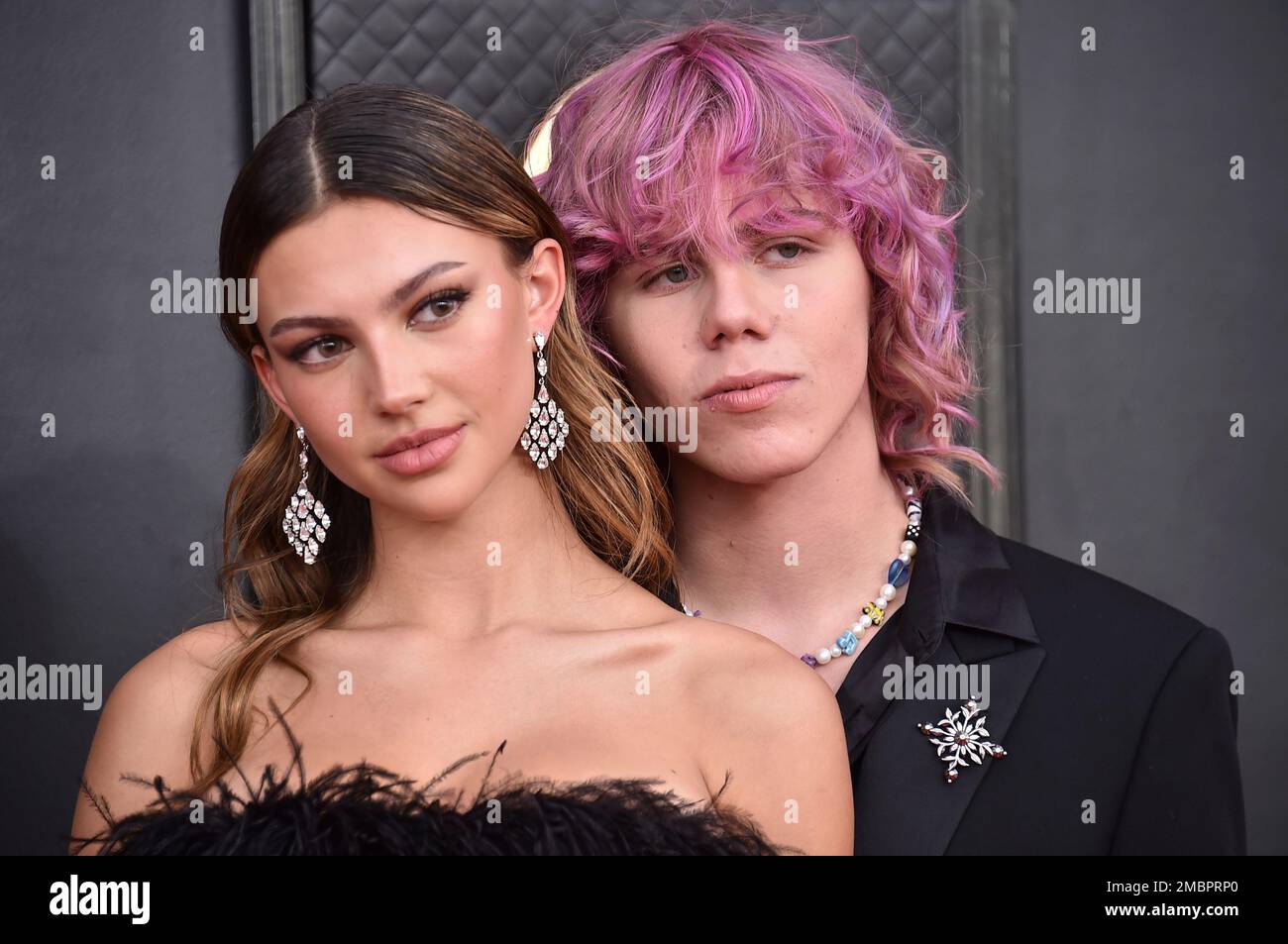 Katarina Deme, left, and The Kid LAROI arrive at the 64th Annual Grammy