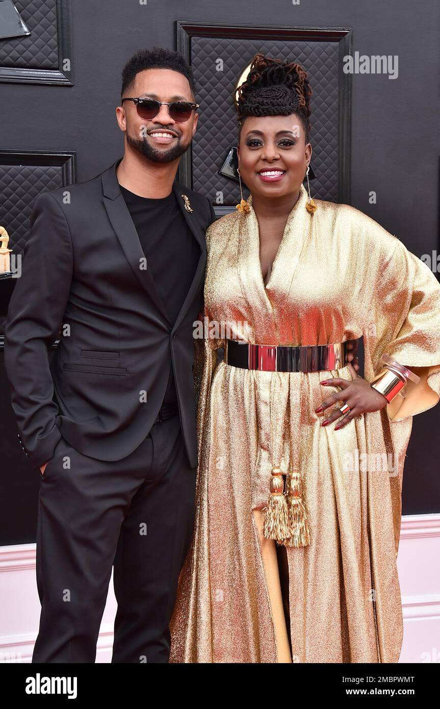 Ronald T. Young, left, and Ledisi arrive at the 64th Annual Grammy