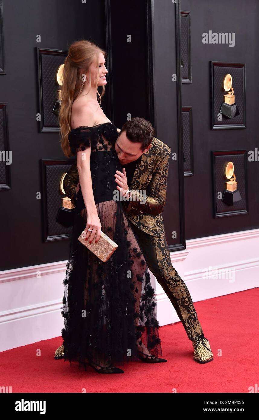 Annika Backes Verwest, left, and Tiesto arrive at the 64th Annual Grammy  Awards at the MGM Grand Garden Arena on Sunday, April 3, 2022, in Las  Vegas. (Photo by Jordan Strauss/Invision/AP Stock