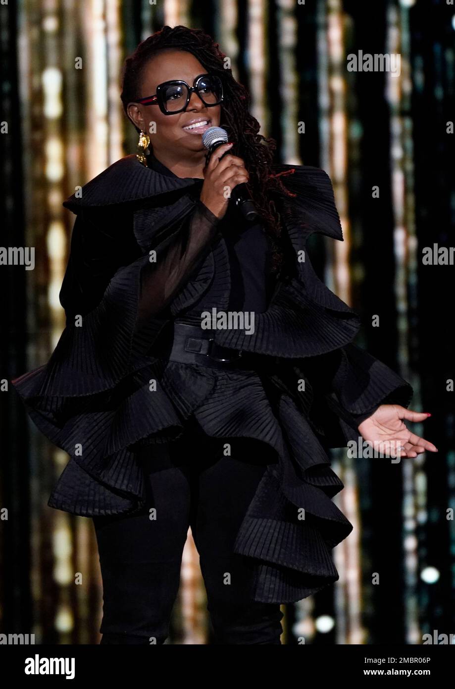 Ledisi presents the Global Impact Award at the Recording Academy Honors