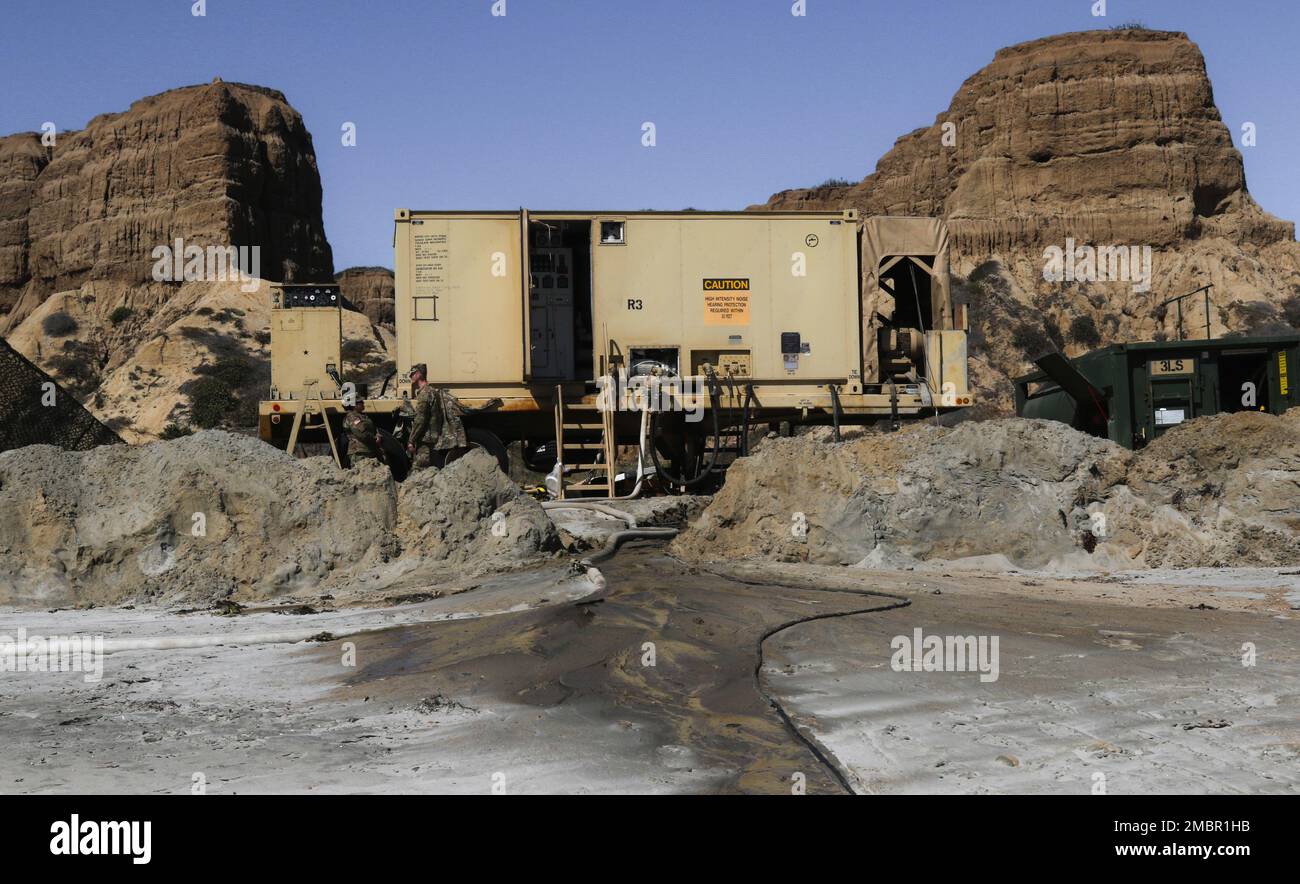 U.S. Army Reserve Soldiers conduct a water quality test using the 3,000