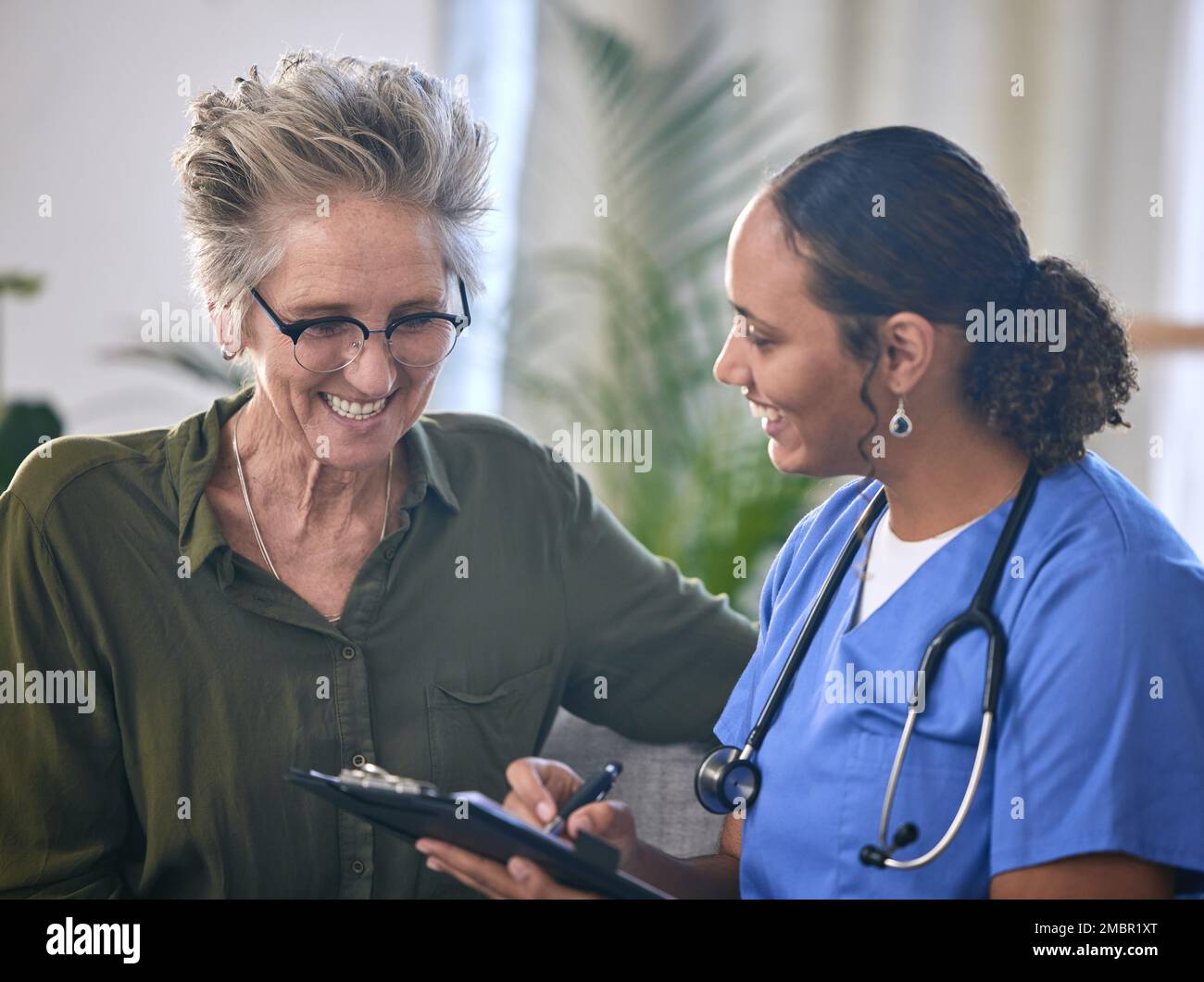 Healthcare, retirement and clipboard with a nurse and woman in
