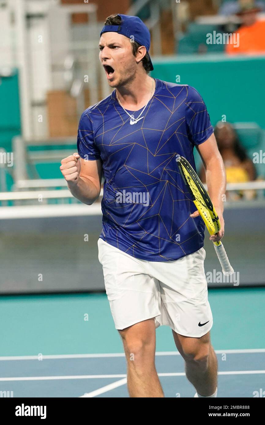 Miomir Kecmanovic of Serbia reacts to a point against Carlos Alcaraz of Spain during the Miami Open tennis tournament, Thursday, March 31, 2022, in Miami Gardens, Fla