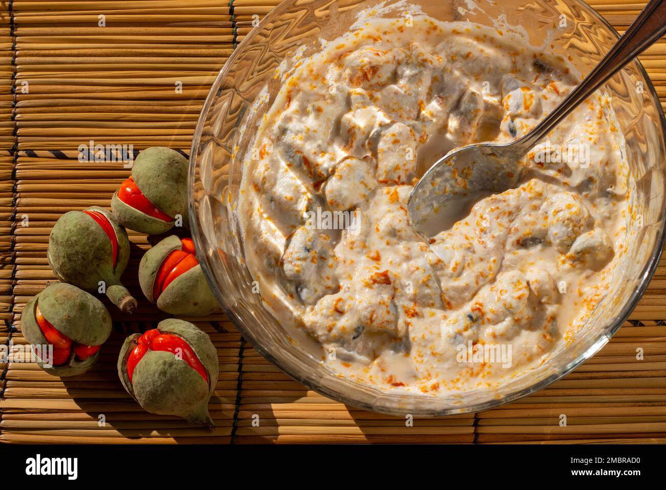 A bowl of mashed Trichilia emetica, also known as Natal mahogany or mafura, the wild fruit is transformed into a creamy and delicious dessert Stock Photo
