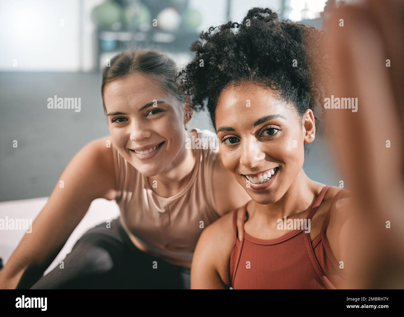 Fitness, friends and portrait at the gym for selfie, happy and smile before exercise routine. Workout, face and girls pose for photo, profile picture Stock Photo