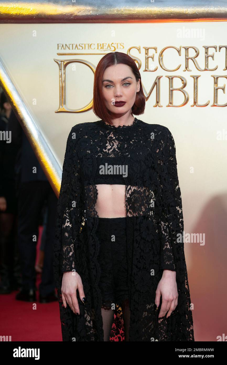 Poppy Corby-Tuech poses for photographers upon arrival at the World