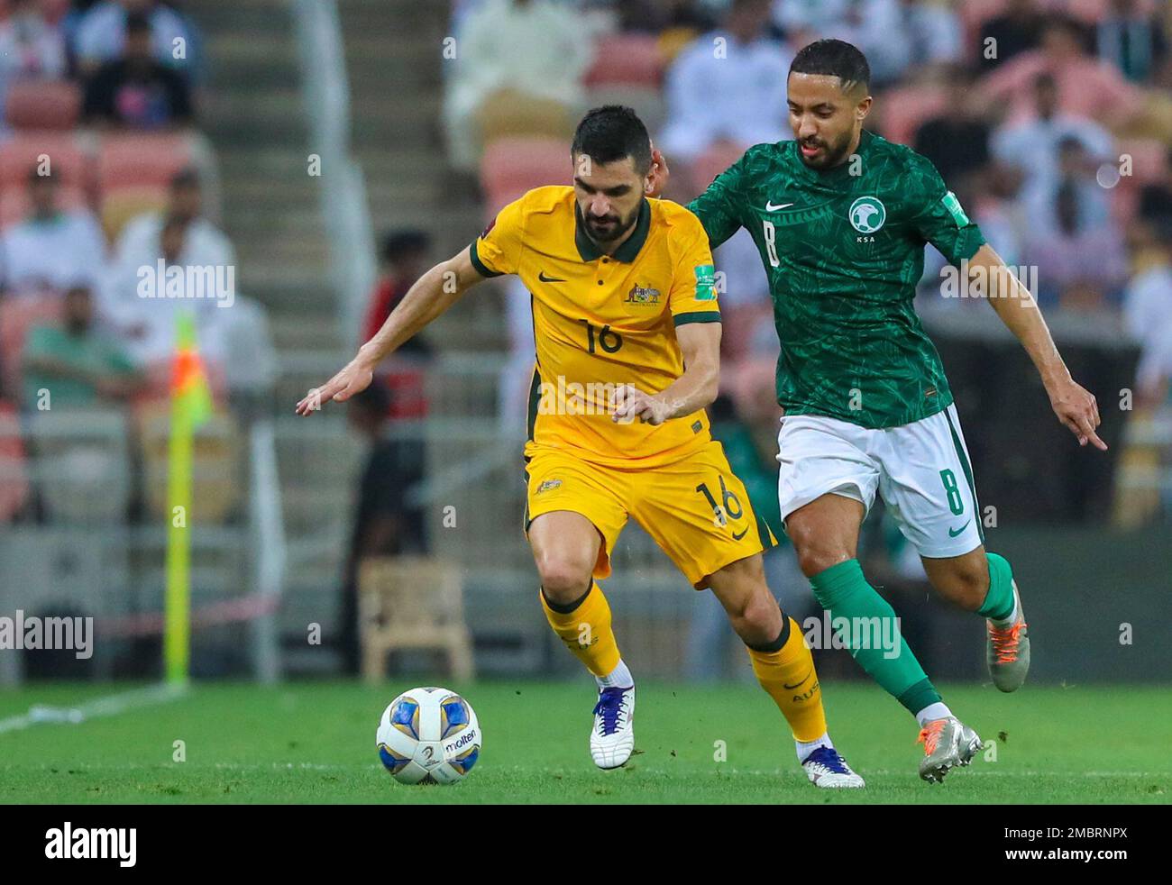 Australias Aziz Behich Left And Saudi Arabias Hatan Babhir Fight