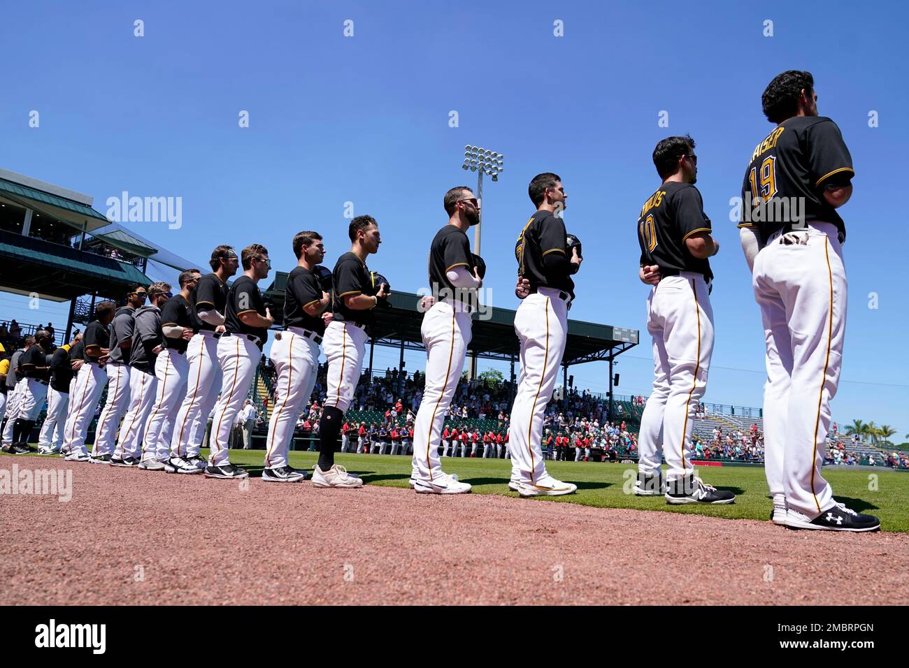 Cleveland, United States. 20th July, 2020. Cleveland Indians Jose Ramirez  (11), Oscar Mercado (35), and Francisco Lindor (12) stand for the National  Anthem prior to an exhibition game against the Pittsburgh Pirates