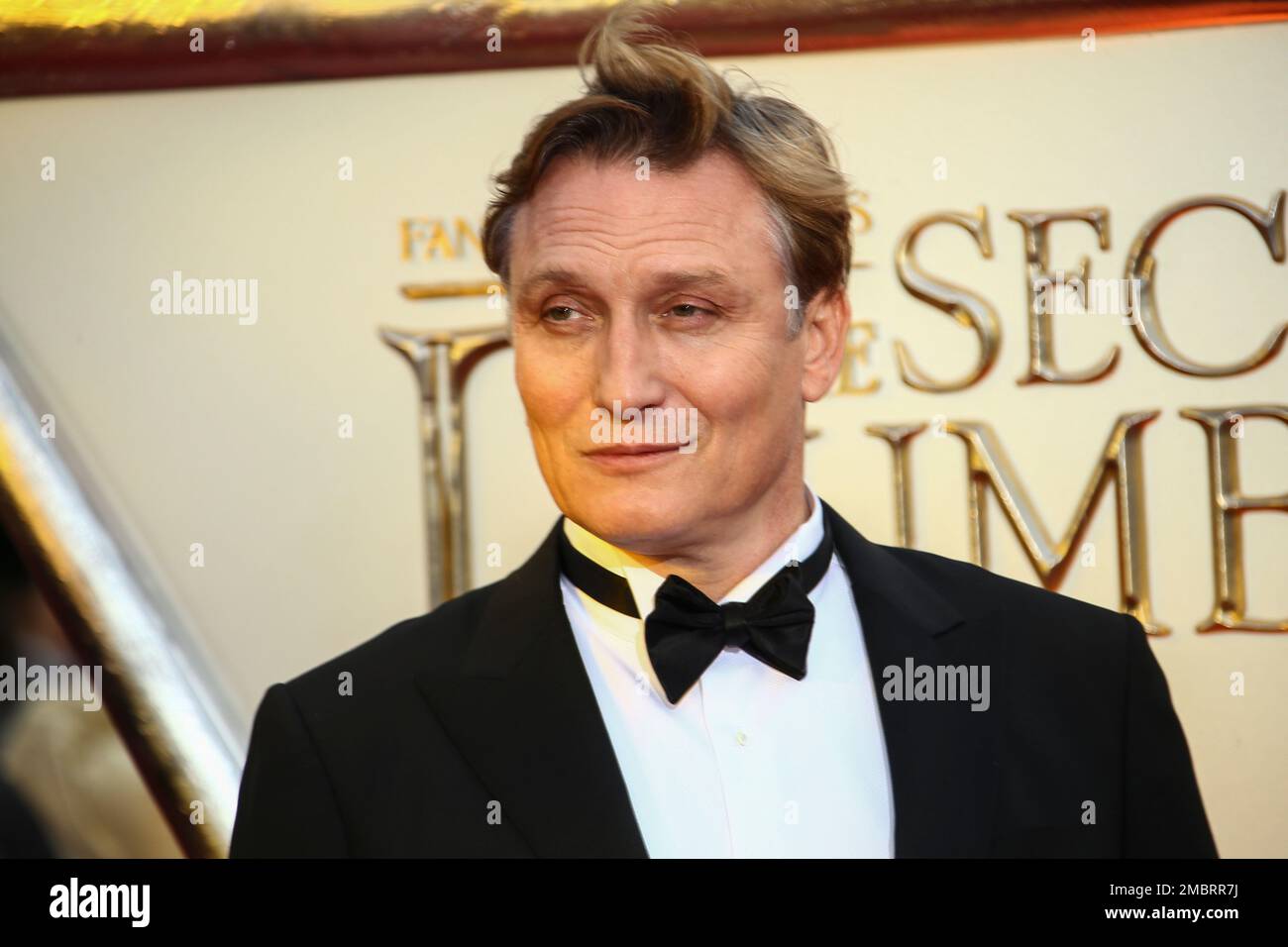 Oliver Masucci poses for photographers upon arrival at the World premiere of the film 