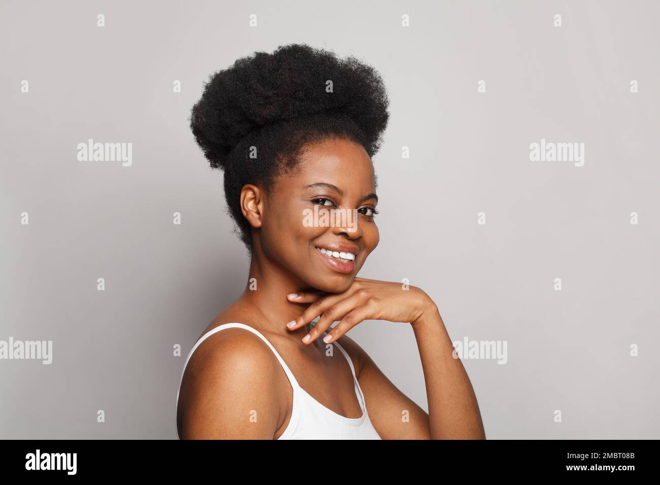Cheerful model woman with dark clean fresh smooth skin portrait. Cute ...