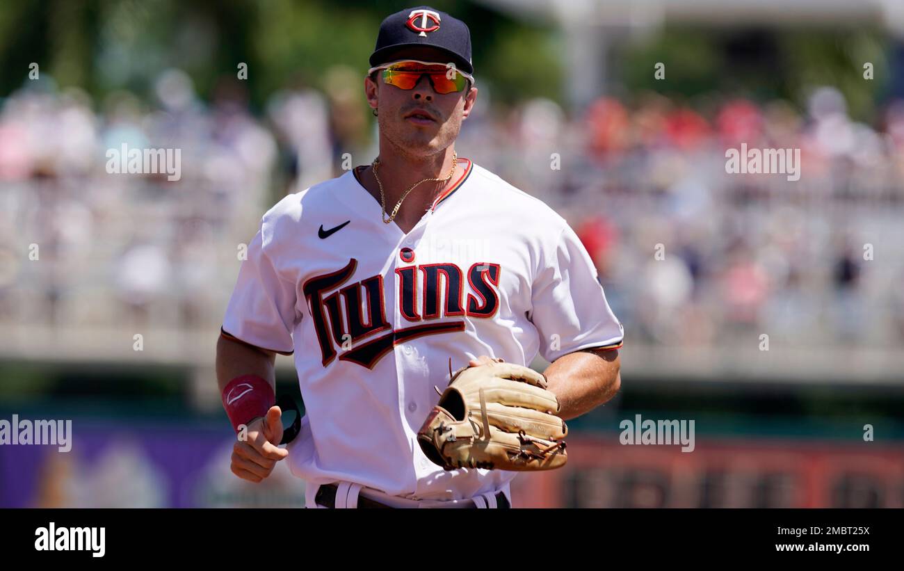 Minnesota Twins right fielder Max Kepler (26) heads to the dugout during a  spring training baseball game against the Boston Red Sox at Hammond Stadium  Sunday March 27, 2022, in Fort Myers