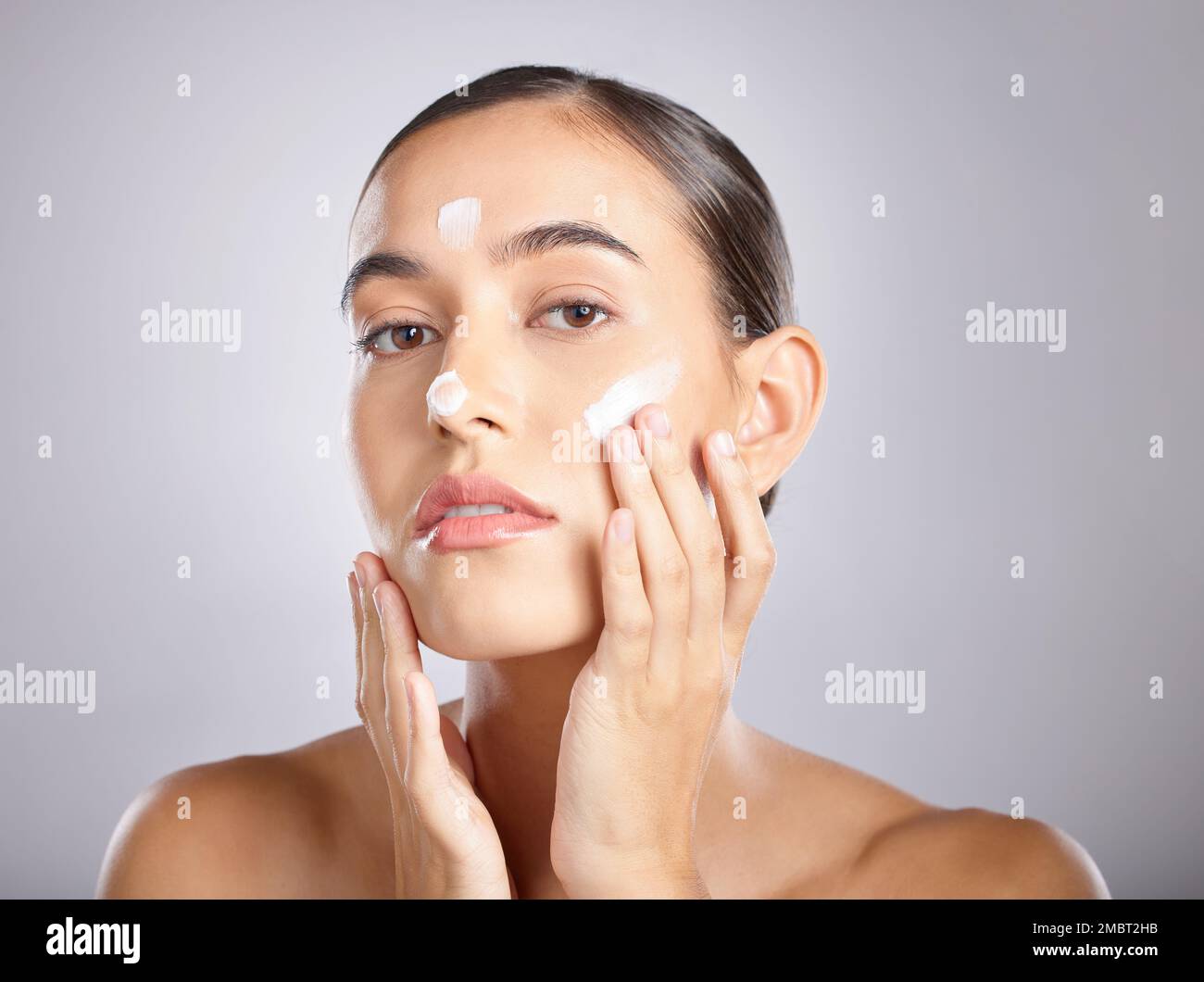 Beauty, face and woman with cream application for luxury healthcare