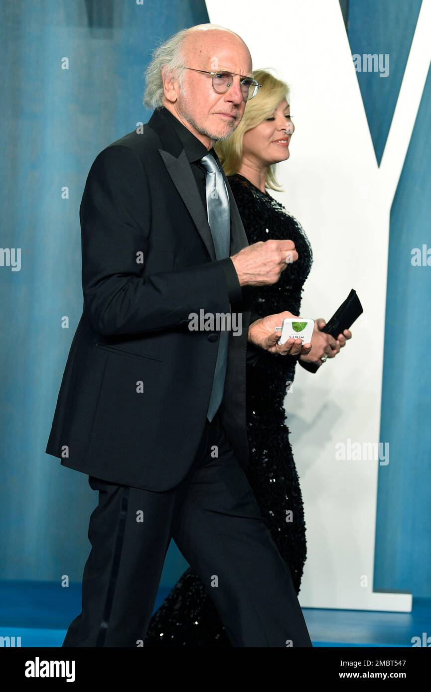 Larry David, left, and Ashley Underwood arrive at the Vanity Fair Oscar  Party on Sunday, March 27, 2022, at the Wallis Annenberg Center for the  Performing Arts in Beverly Hills, Calif. (Photo