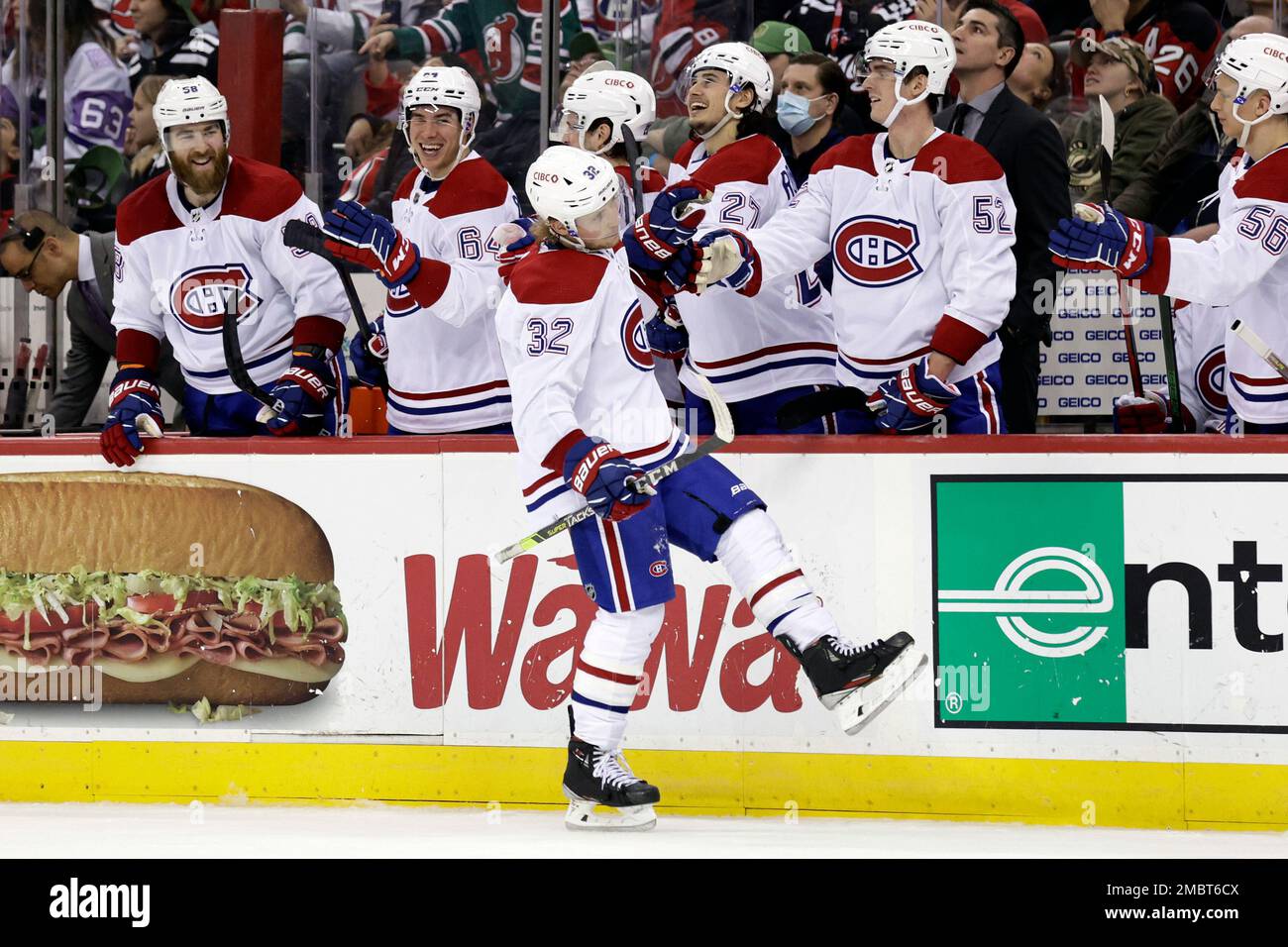 Montreal Canadiens center Rem Pitlick (32) celebrates after scoring a