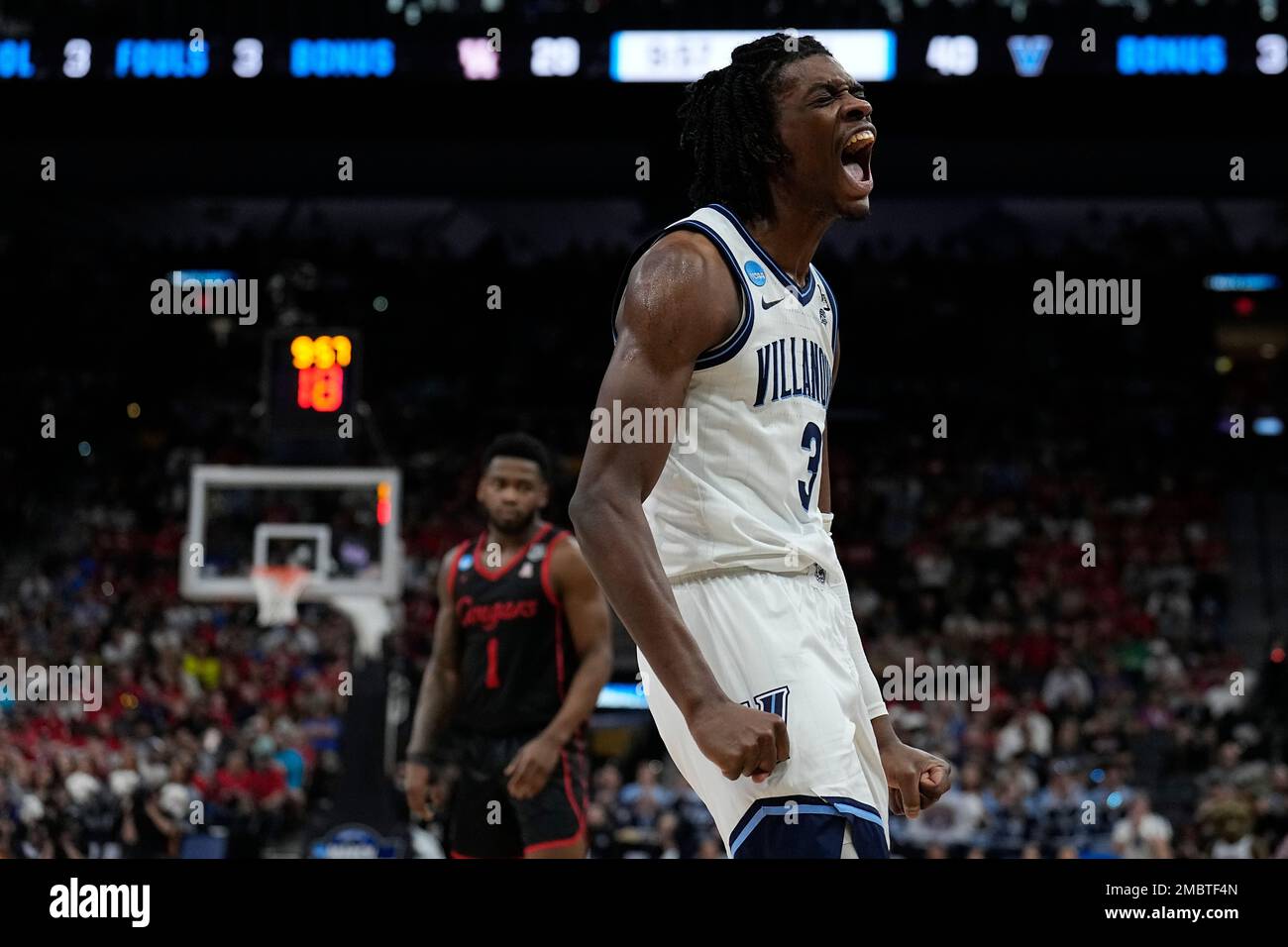 Villanova forward Brandon Slater celebrates after scoring against