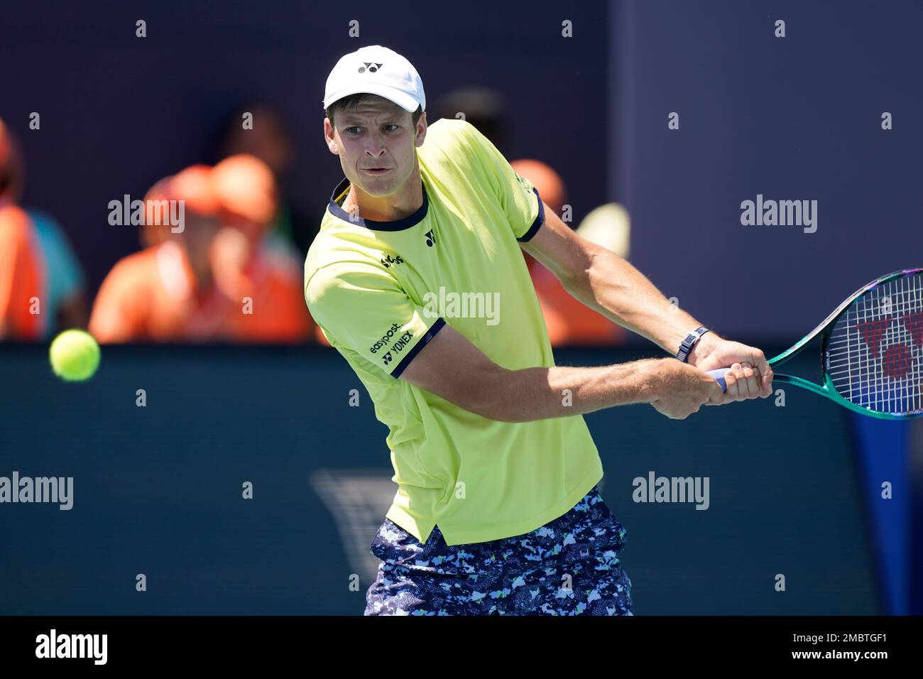 Hubert Hurkacz, of Poland returns a shot from Arthur Rinderknech, of France, during the Miami Open tennis tournament, Saturday, March 26, 2022, in Miami Gardens, Fla