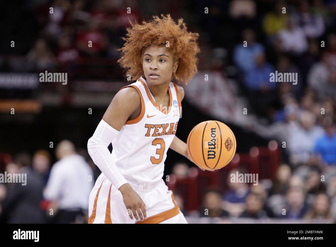 Texas guard Rori Harmon controls the ball during a college basketball ...