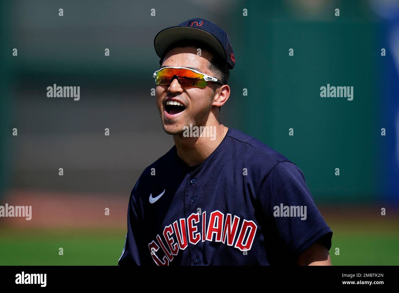 Cleveland Guardians' Steven Kwan smiles as he warms up prior to a