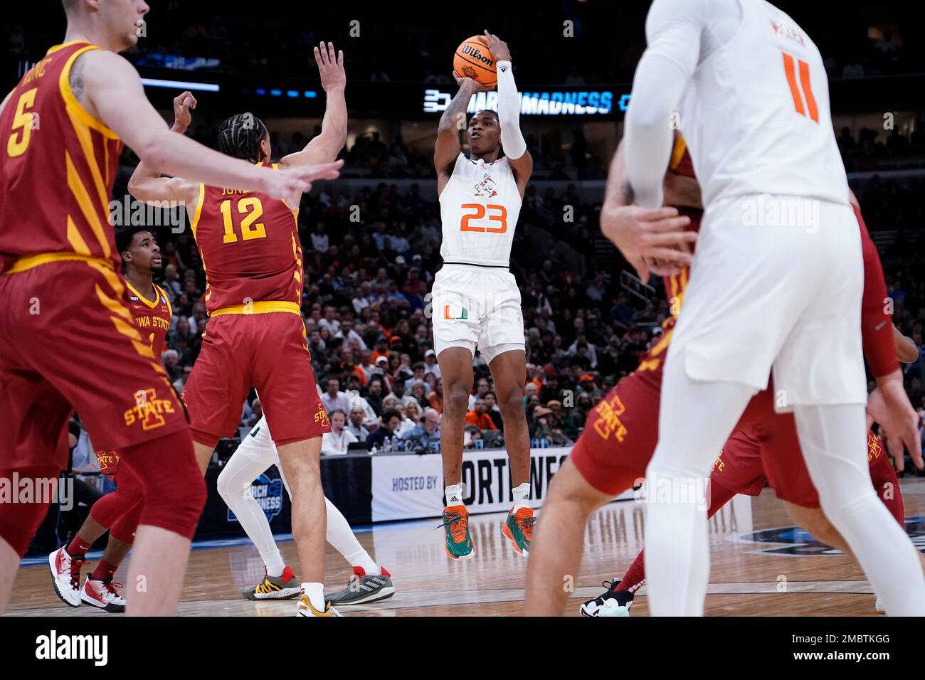 Miami's Kameron McGusty shoots during the first half of a college