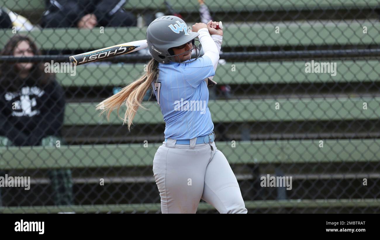 Warner Pacific's Jessie Ramirez bats during an NCAA softball game