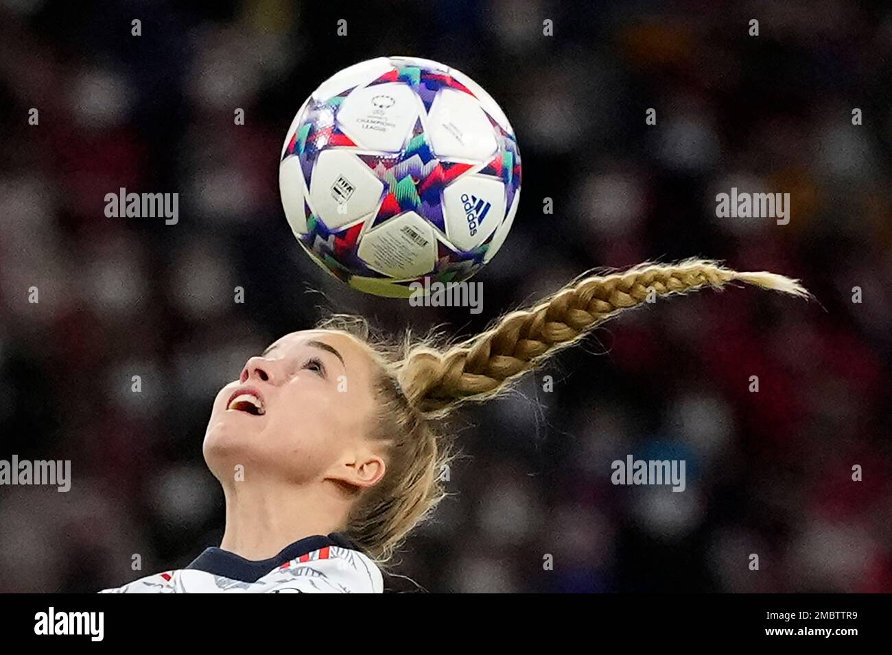 Bayern's Giulia Gwinn heads the ball during the women's quarterfinal Champions  League first leg soccer match between Bayern Munich and Paris Saint-Germain  in Munich, Germany, Tuesday, March 22, 2022. (AP Photo/Matthias Schrader