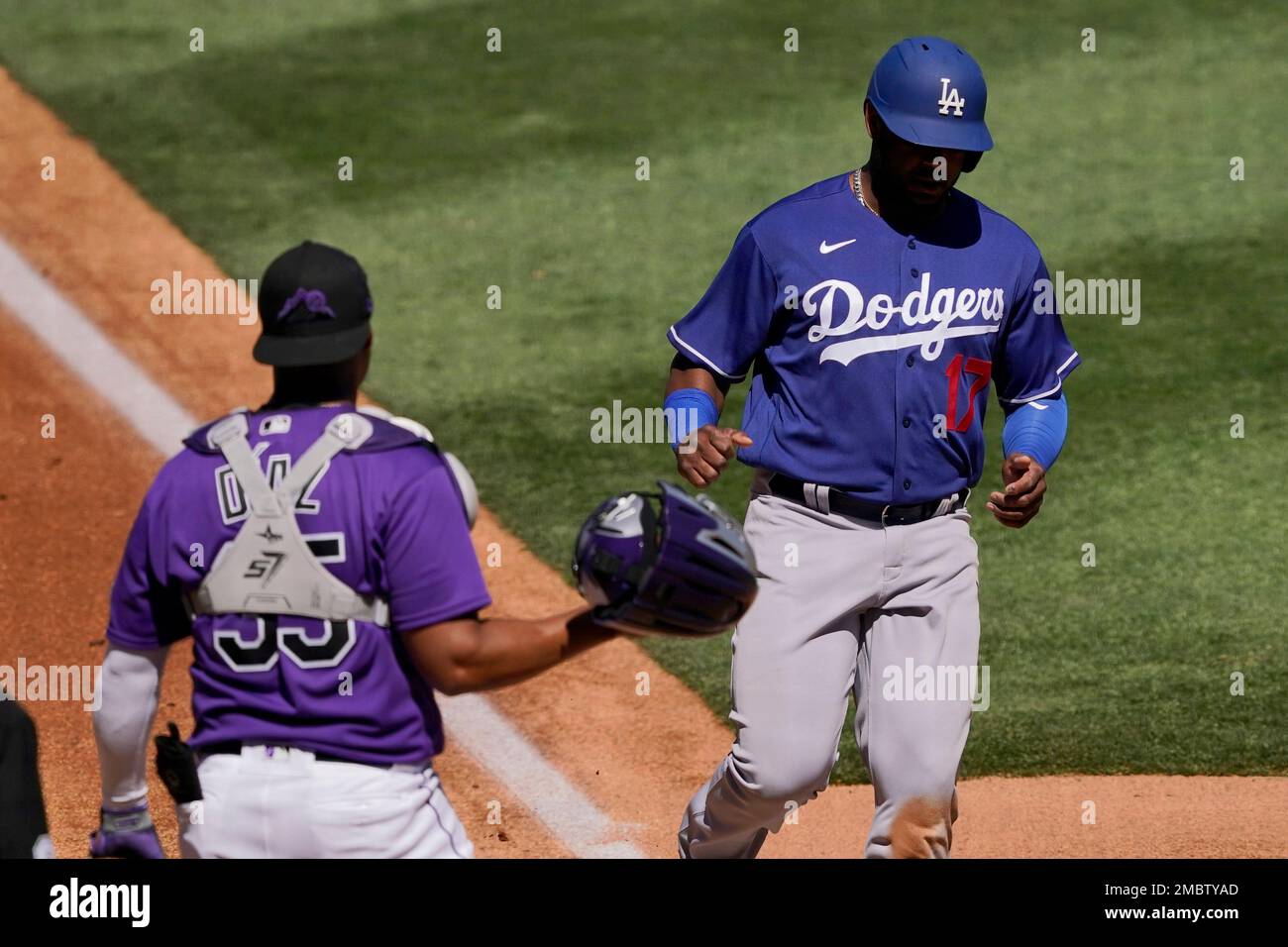 Los Angeles Dodgers' Hanser Alberto (17) scores on a double hit by