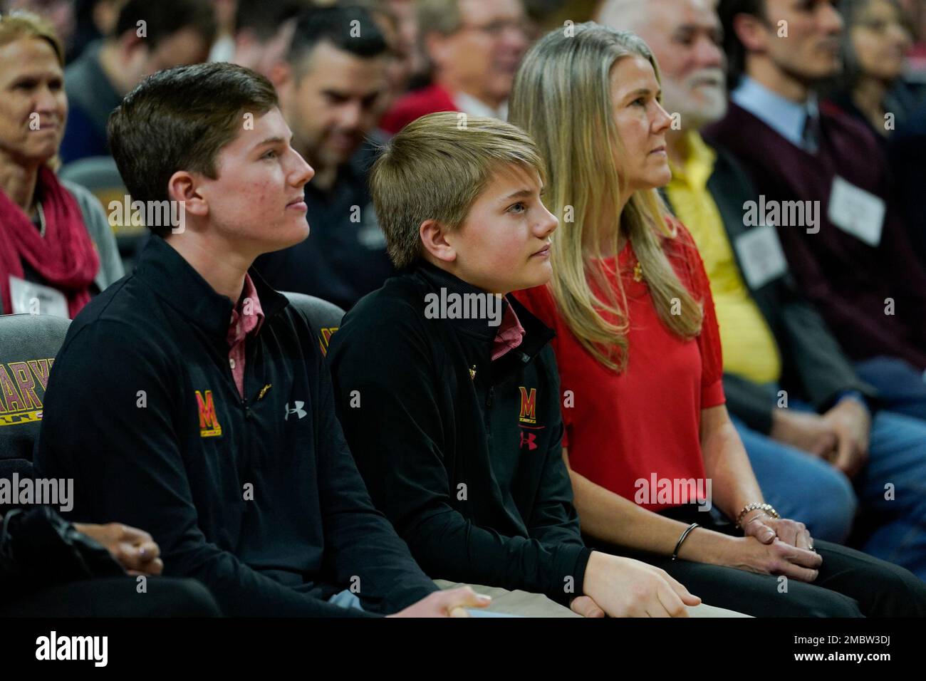 Kevin Willard's family, his sons Colin, second left, and Chase, center