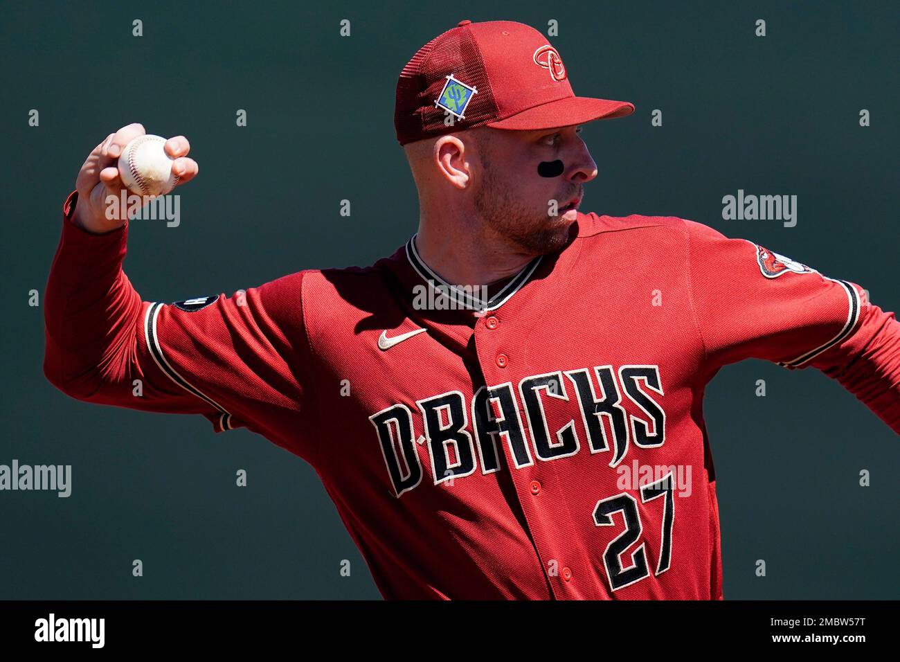 Arizona Diamondbacks third baseman Drew Ellis warms up during the first  inning of a spring training baseball game against the San Francisco Giants  Wednesday, March 23, 2022, in Scottsdale, Ariz. (AP Photo/Ross