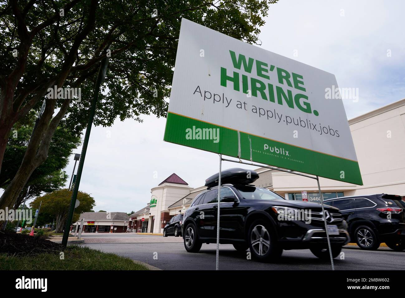 A We're Hiring sign at a Publix supermarket in Richmond, Va., Wednesday