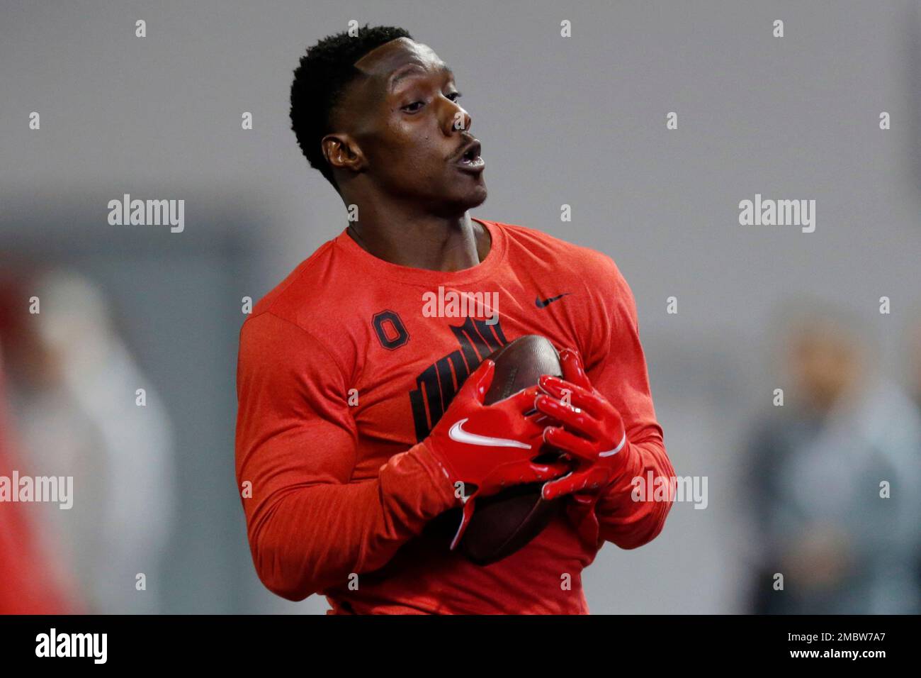 Cornerback Demario McCall runs a football drill during Ohio State Pro