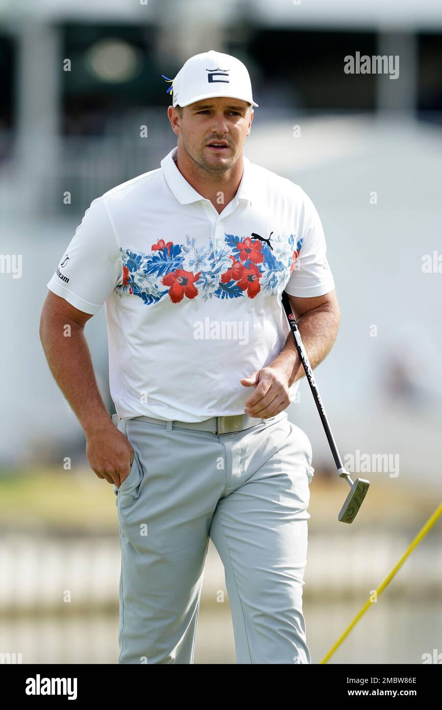 Bryson DeChambeau watches play on the 12th green in the first round of the Dell Technologies Match Play Championship golf tournament, Wednesday, March 23, 2022, in Austin, Texas