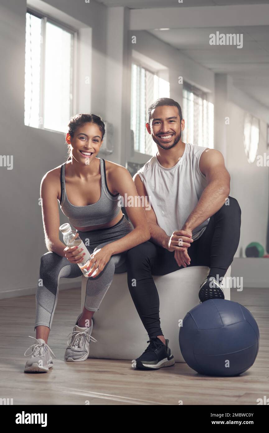 Life is too short not to work out. two young athletes sitting together