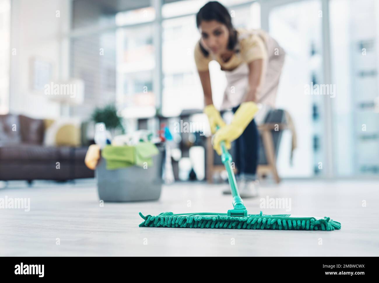 Cleaning Sign And Woman Mopping Floor In Office For Hygiene Health